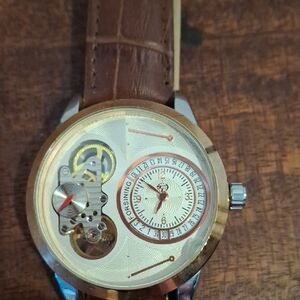 Brown and Silver Water Resistant Skeleton Watch